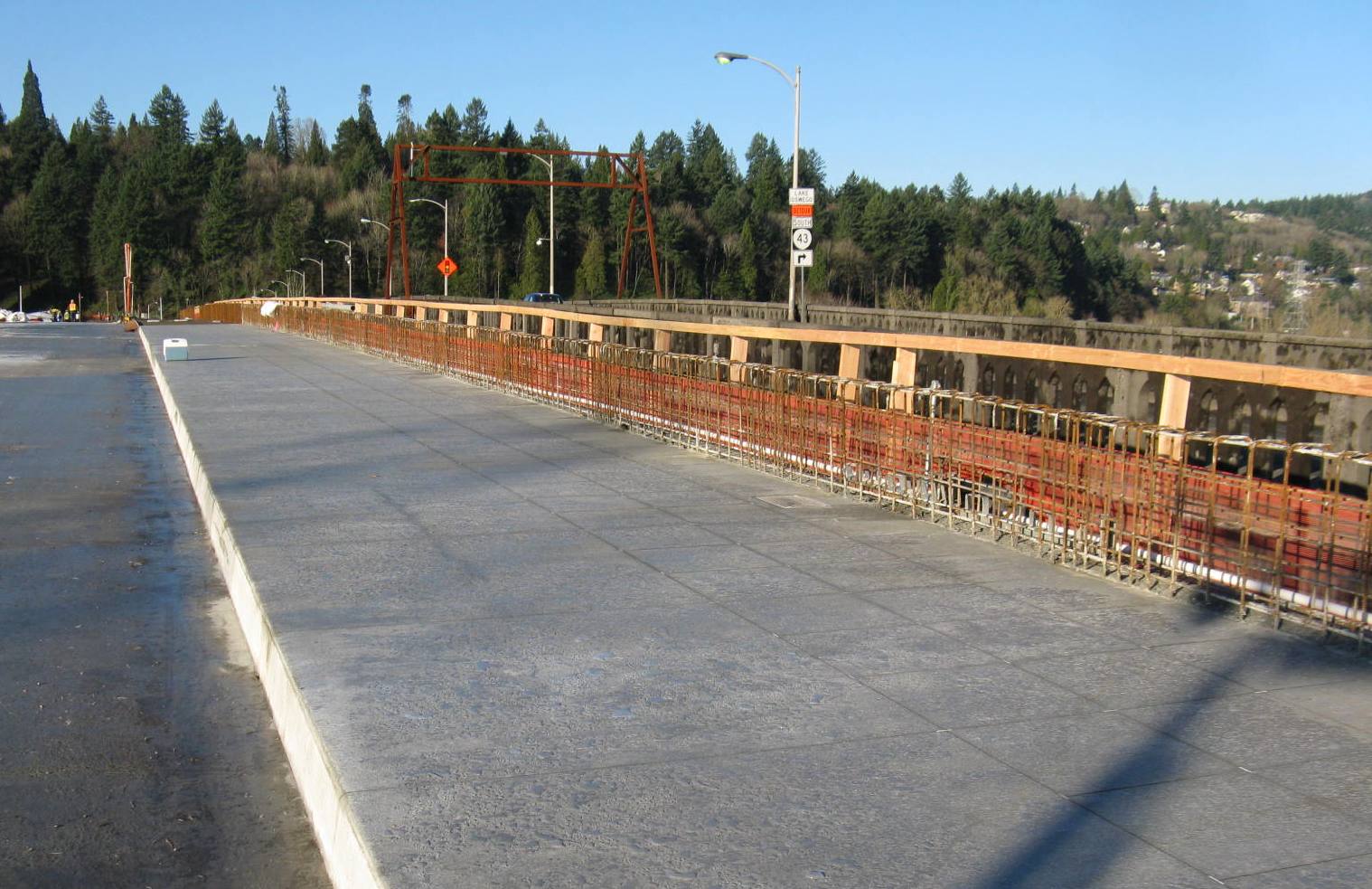 Pouring concrete for last major deck section on center span of the new Sellwood Bridge.